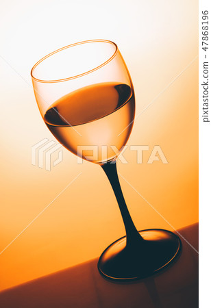 glass of white wine close-up 47868196
