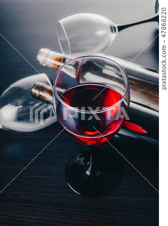 wine glasses and bottles 47868220