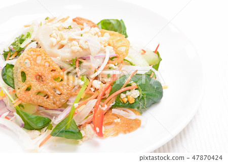 Delicious lotus root and flavored vegetable salad 47870424