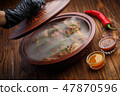 Delicious barbecued ribs seasoned with sauce 47870596