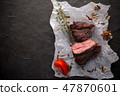Grilled ostrich steak with spices on black 47870601