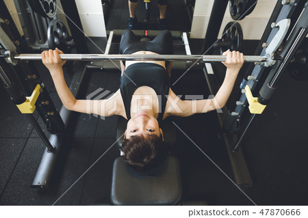 Weight training young lady Weight training young lady 47870666