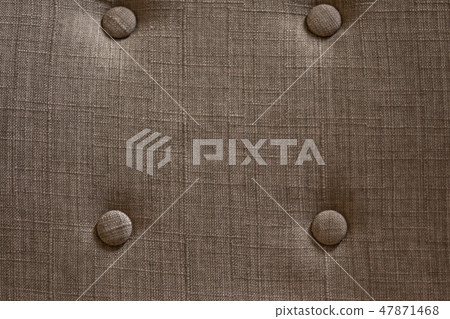 brown fabric structure with four knobs on a chair brown fabric structure with four knobs on a chair 47871468