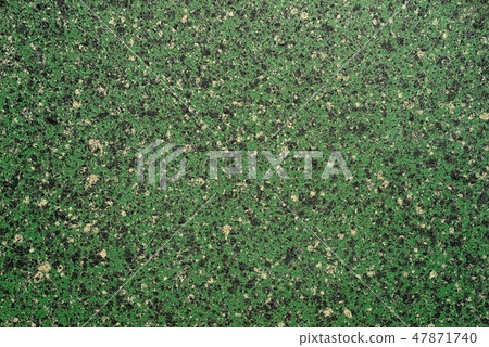 Green nonstick stone crumb background. Green nonstick stone crumb background. 47871740