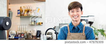 Cheerful male Asian entrepreneur in coffee shop Cheerful male Asian entrepreneur in coffee shop 47876309
