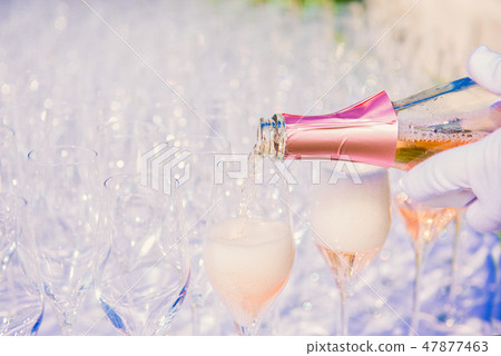 Waiter pouring champagne, sparkling wine 47877463