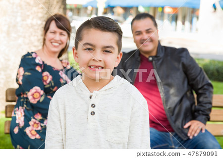 Mixed Race Young Family Portrait At The Park Mixed Race Young Family Portrait At The Park 47879091