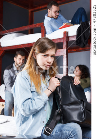 Upset girl with backpack 47883525