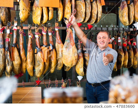 Customer buying iberico or serrano jamon leg Customer buying iberico or serrano jamon leg 47883600