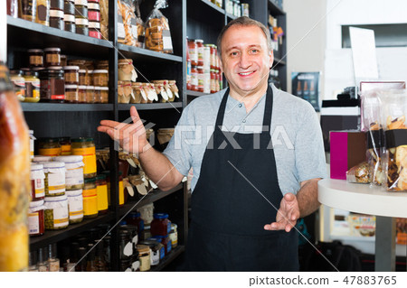 man standing near counter 47883765