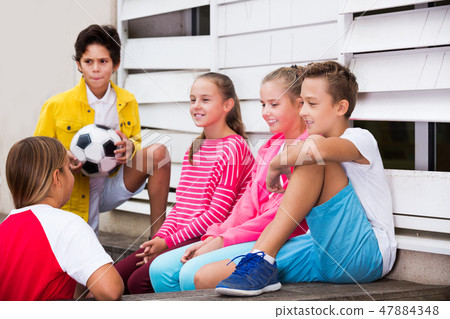 boys and girls are communicating outdoor boys and girls are communicating outdoor 47884348
