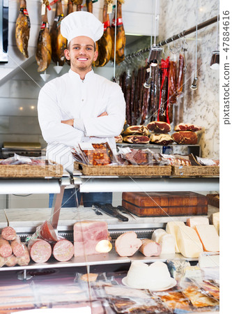 Young cook at butcher store Young cook at butcher store 47884616