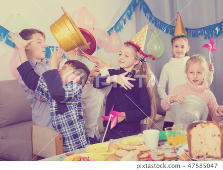 different ages kids having a good time at a birthday party different ages kids having a good time at a birthday party 47885047
