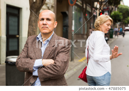 irritated man outdoors 47885075