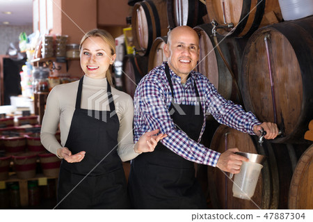 Portrait of two adult glad wine makers Portrait of two adult glad wine makers 47887304