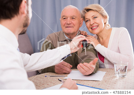 Couple buying car Couple buying car 47888154