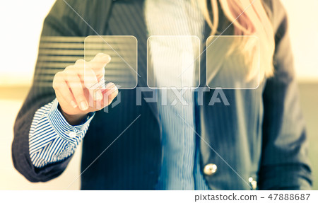 Woman touching screen Woman touching screen 47888687