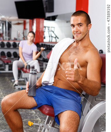 Man with naked body at sports club 47889192