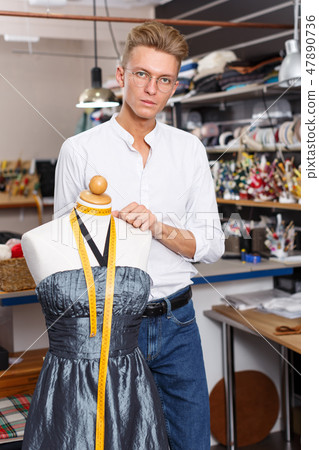 Portrait of blond male dressmaker Portrait of blond male dressmaker 47890736