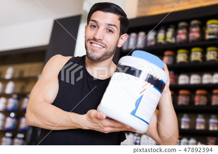 seller showing different sport nutrition seller showing different sport nutrition 47892394