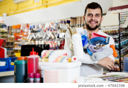 Male customer purchasing tools for house improvements Male customer purchasing tools for house improvements 47892396