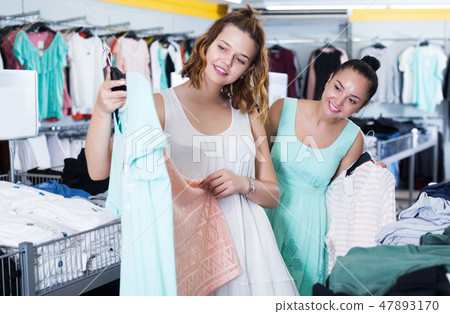 Customers looking for new garments Customers looking for new garments 47893170