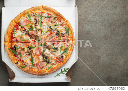 Italian fast food. Delicious hot pizza in a box Italian fast food. Delicious hot pizza in a box 47895062