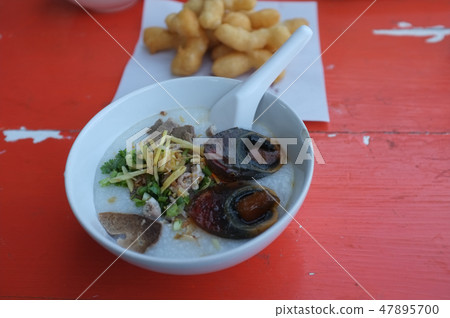 Rice soup minced pork and entrails  47895700