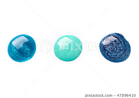 Nail polish drops on white background isolated. Nail polish drops on white background isolated. 47896410