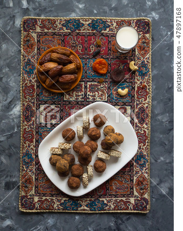 Energy balls with dates and milk. Top view. Energy balls with dates and milk. Top view. 47897168
