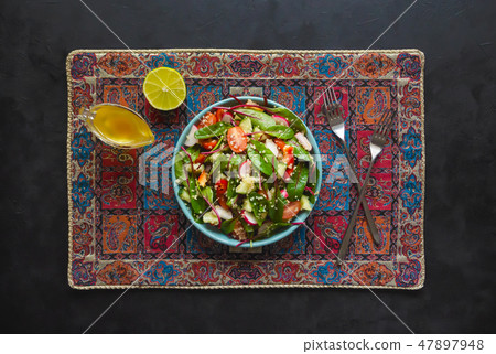 Fresh Red Shard Salad with quinoa and tomatoes.  47897948