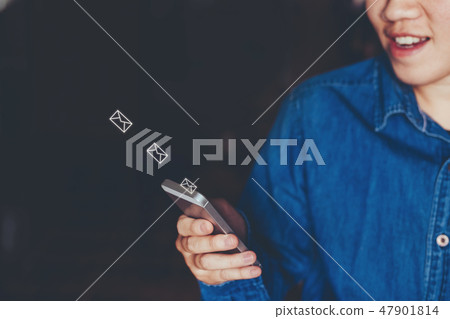 Businessman using mobile online icon social  47901814