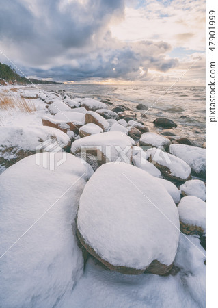 Baltic Sea coast in winter with stones Baltic Sea coast in winter with stones 47901999