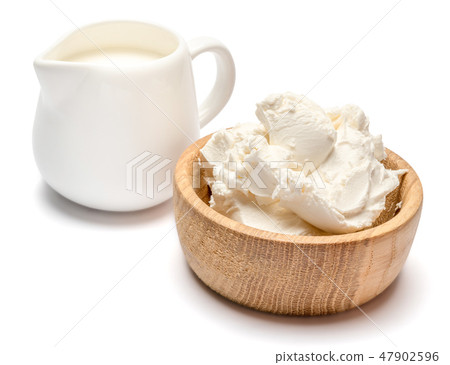 Traditional Mascarpone cheese and cream or milk isolated with clipping path Traditional Mascarpone cheese and cream or milk isolated with clipping path 47902596
