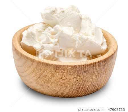 Traditional Mascarpone cheese in wooden bowl isolated with clipping path Traditional Mascarpone cheese in wooden bowl isolated with clipping path 47902733