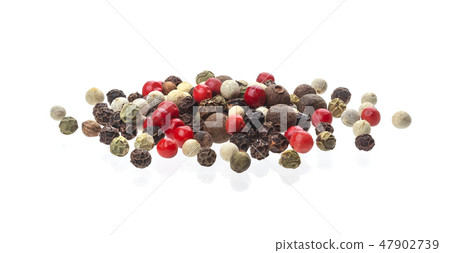 Heap of black, red, white peppercorn seeds isolated on white background Heap of black, red, white peppercorn seeds isolated on white background 47902739