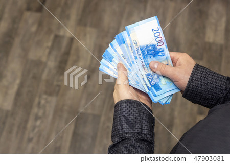 Hands recount rubles cash money Hands recount rubles cash money 47903081