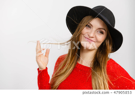 Lady playing with hairs. Lady playing with hairs. 47905853