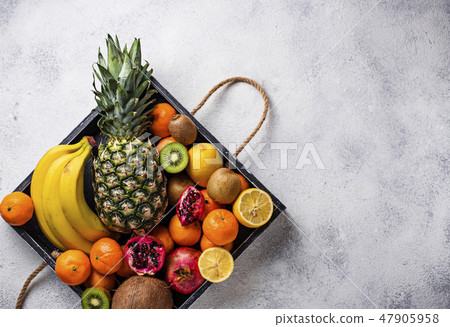 Assortment of fresh tropical fruits 47905958
