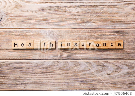 Health insurance word written on wood block. 47906468