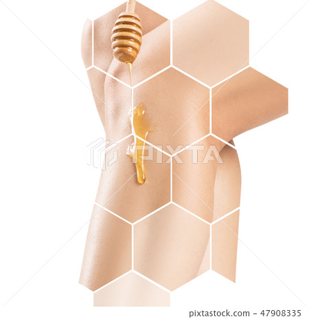 Female legs depilation by honey or sugar pasta. 47908335