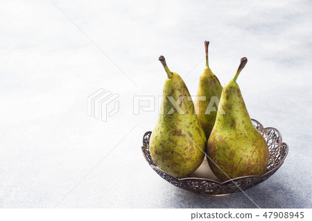 Fresh juicy Pears Conference in a basket Fresh juicy Pears Conference in a basket 47908945