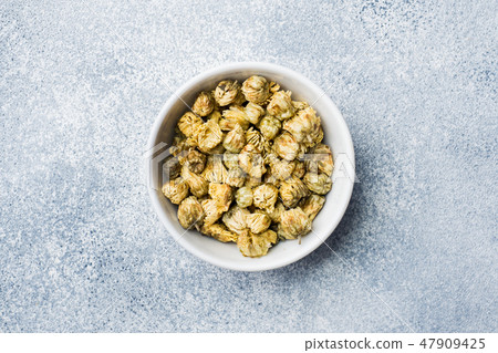 Tea flowers for brewing in bowl  47909425