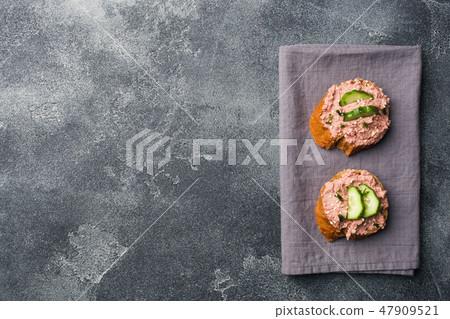 Sandwiches with chicken pate and cucumber Sandwiches with chicken pate and cucumber 47909521
