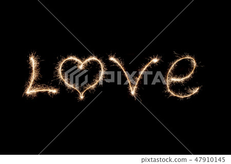 Love word written by sparklers . 47910145