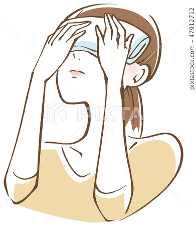 A woman hitting a steamed towel on her eyes 47912712