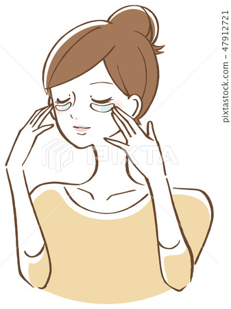 A woman packing her eyes A woman packing her eyes 47912721