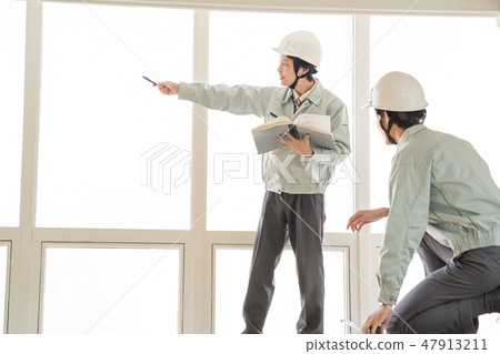 Apply for construction confirmation with safety patrol Measure and check the drawing of the duplicate and the on-site dimensions Two male inspectors of the helmet Architects Engineer Apply for construction confirmation with safety patrol Measure and check the drawing of the duplicate and the on-site dimensions Two male inspectors of the helmet Architects Engineer 47913211