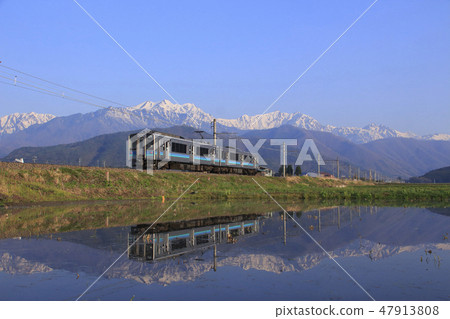 Northern Alps fringes of melting snow and Otsuki Line E127 series 47913808