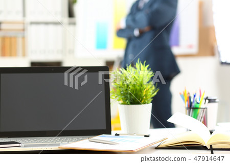 Silver pen lying on important stats paper clipped to pad Silver pen lying on important stats paper clipped to pad 47914647